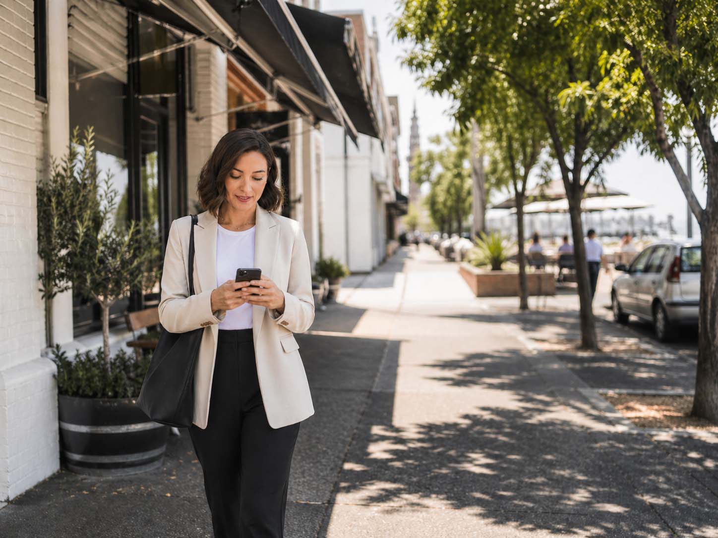 Business woman on the phone near Bay Street for SEO Port Melbourne services
