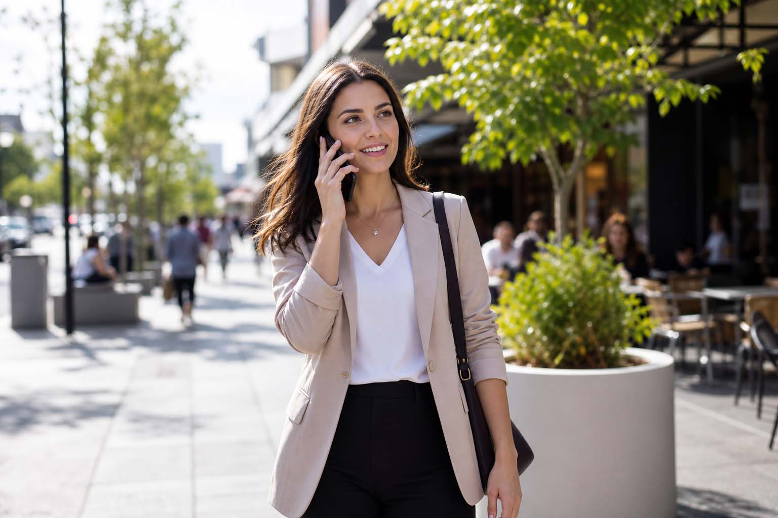 Professional woman on the phone near Dandenong shops for SEO Dandenong business marketing