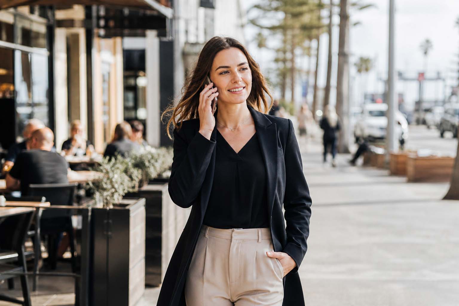 Professional woman on the phone near Frankston shops for SEO Frankston business marketing