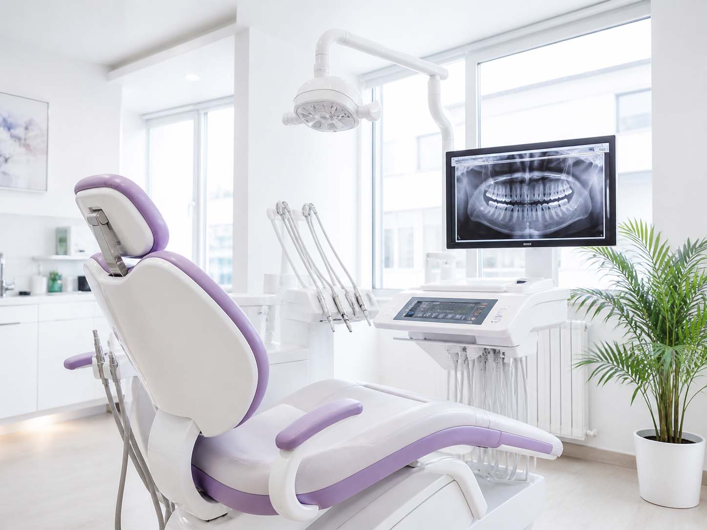 Modern dental clinic with treatment chair and digital X-ray screen representing Dental SEO services for clinics wanting more patient enquiries.