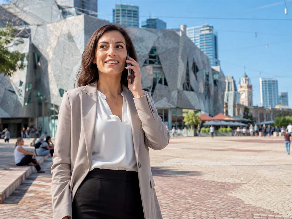 Businesswoman on the phone seo consulting at Federation Square