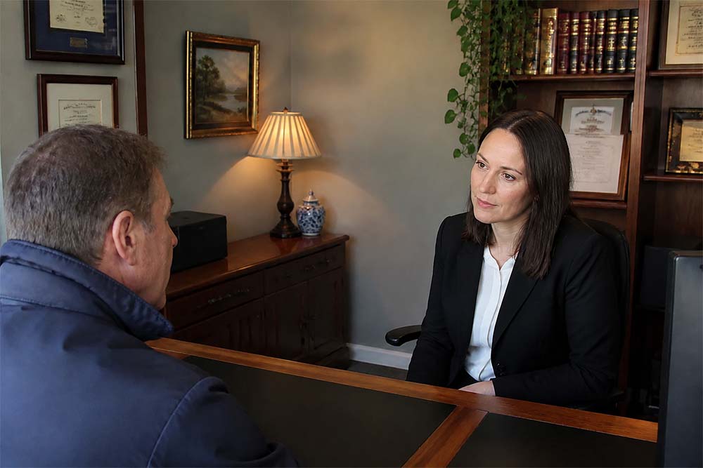 Professional woman reviewing law firm SEO strategy for client enquiries