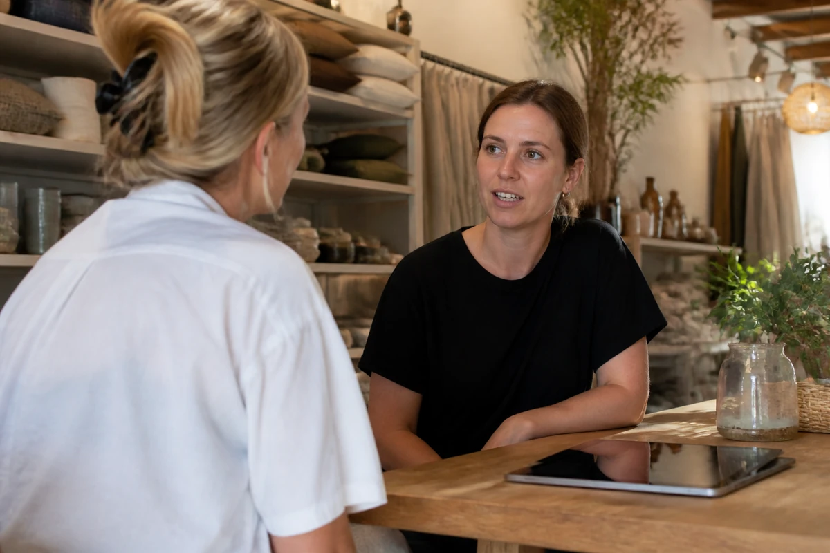 Average Australian small business owner in a realistic local business setting having a natural conversation related to the article topic, no